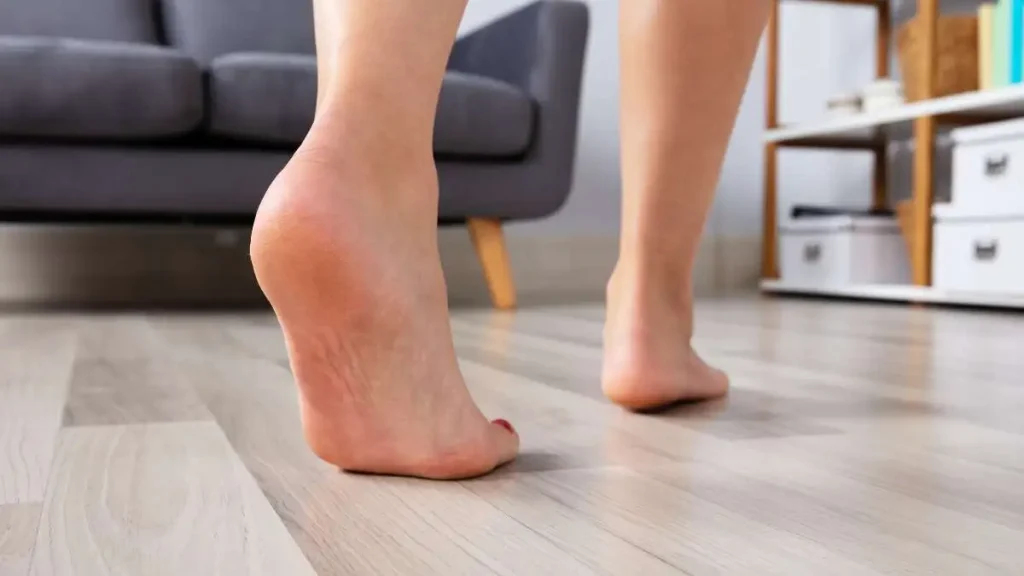 4 - a picture of feet on top of floor